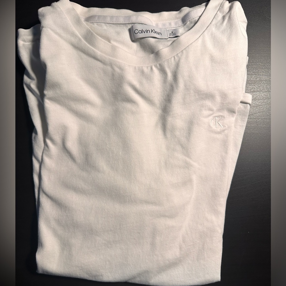 Size M Calvin Klein white tee with CK lettering